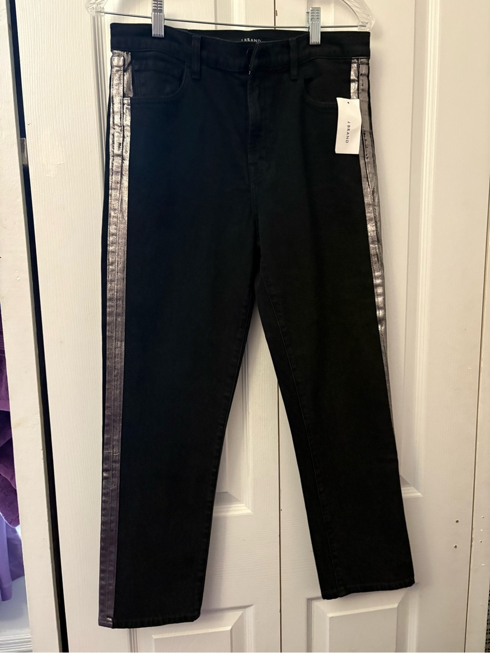 J Brand sleek cropped jeans. High-rise waist, tapered leg metallic silver stripe